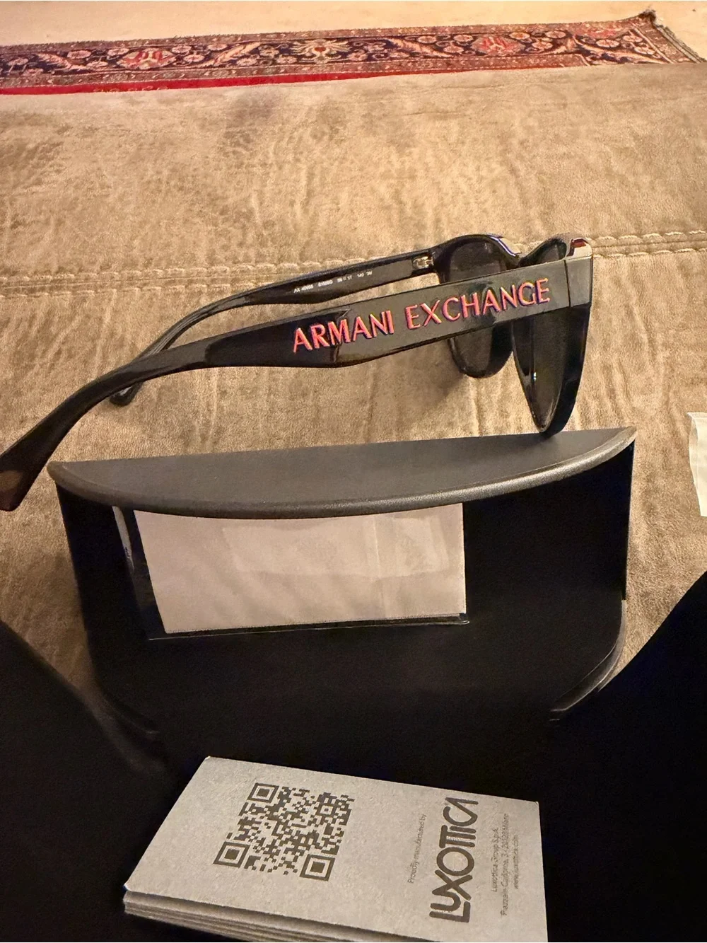 Armani Exchange Black Cat-Eye Sunglasses with Red Logo Accent